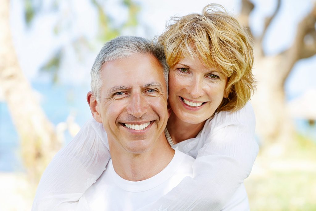Healthy happy senior couple. Anti-Aging Services in Newport Beach, Dr. Christopher Asandra, MD, San Diego, CA.
